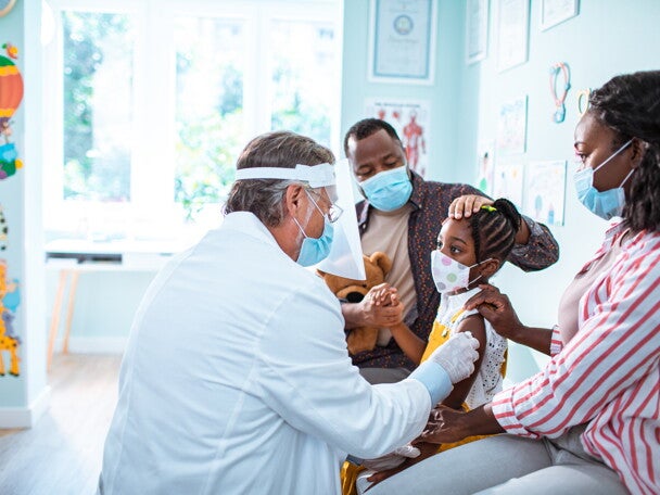 Vaccines and immunization are the first protection against diseases. A little girl getting her vaccines and immunization.