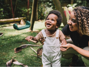 A baby with her mother during family games