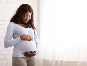 A pregnant lady after taking folic acid in pregnancy.