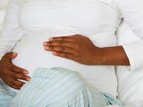 Women using a breast pump in a public place.