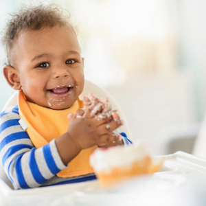  A baby eating solid food the baby-led weaning method.