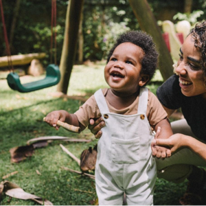 A baby with her mother during family games