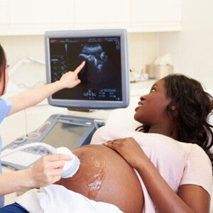 A couple during a medical check to avoid ectopic gestation. 