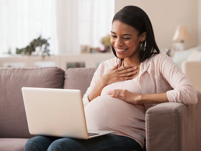 A pregnant woman preparing her maternity leave.