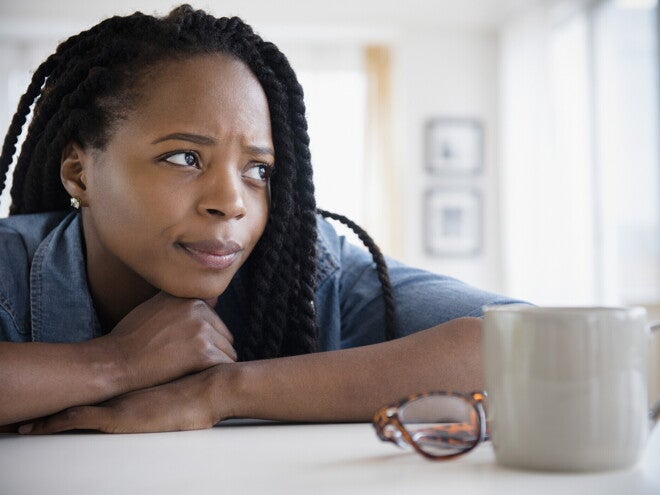 A mother feeding her baby and dealing with postpartum depression.