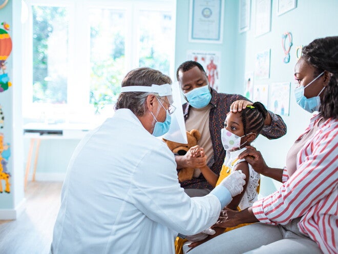 Vaccines and immunization are the first protection against diseases. A little girl getting her vaccines and immunization.