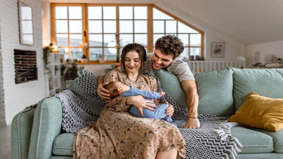 Nutrition for fertility is vital for men and women. A couple enjoying their baby after a good nutrition for fertility.